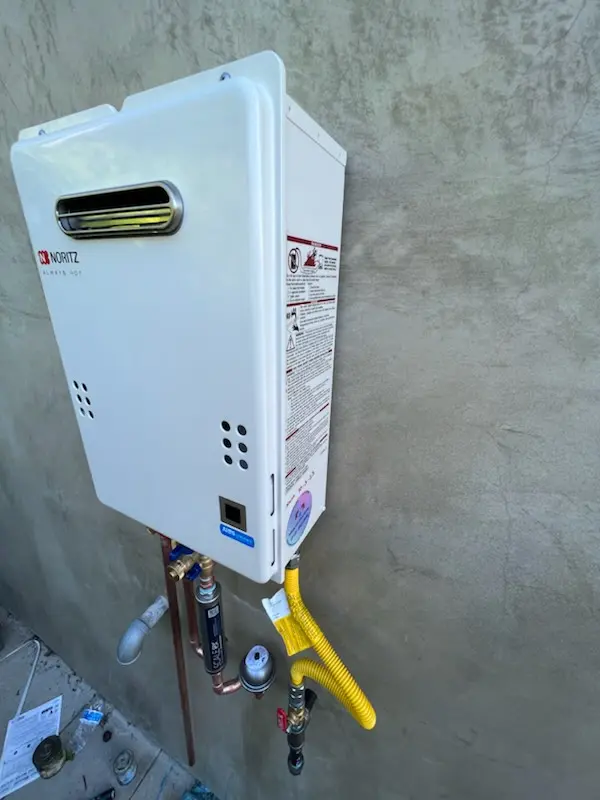 Tankless water heater installation for Chester Plaza homes
